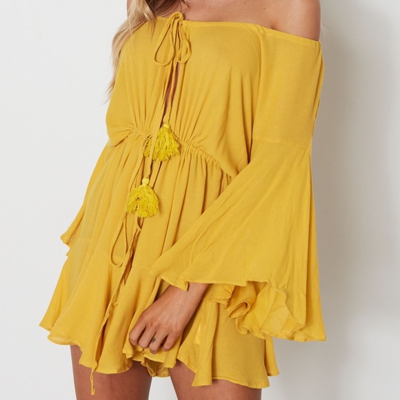 White Fox Boutique Marigold Yellow Tassel Tie Ruffle Romper Jumper - Picture 7 of 15